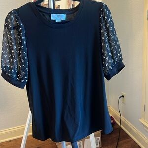 CeCe top black and floral. Medium